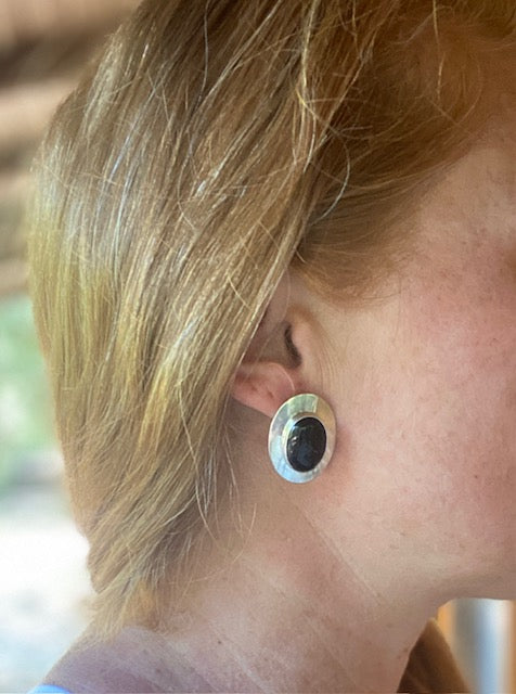 oval onyx stone earring shown on model 