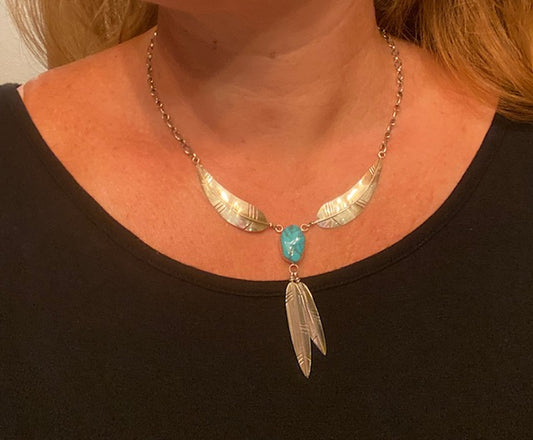 Four Feathers and a Turquoise Stone Necklace