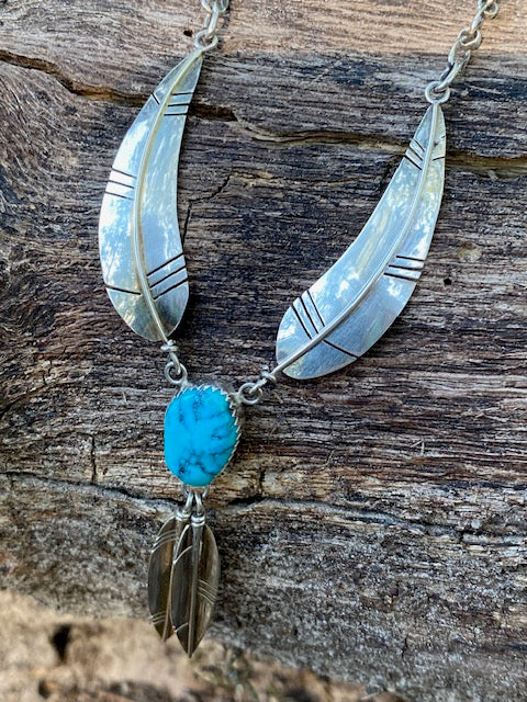 Four Feathers and a Turquoise Stone Necklace